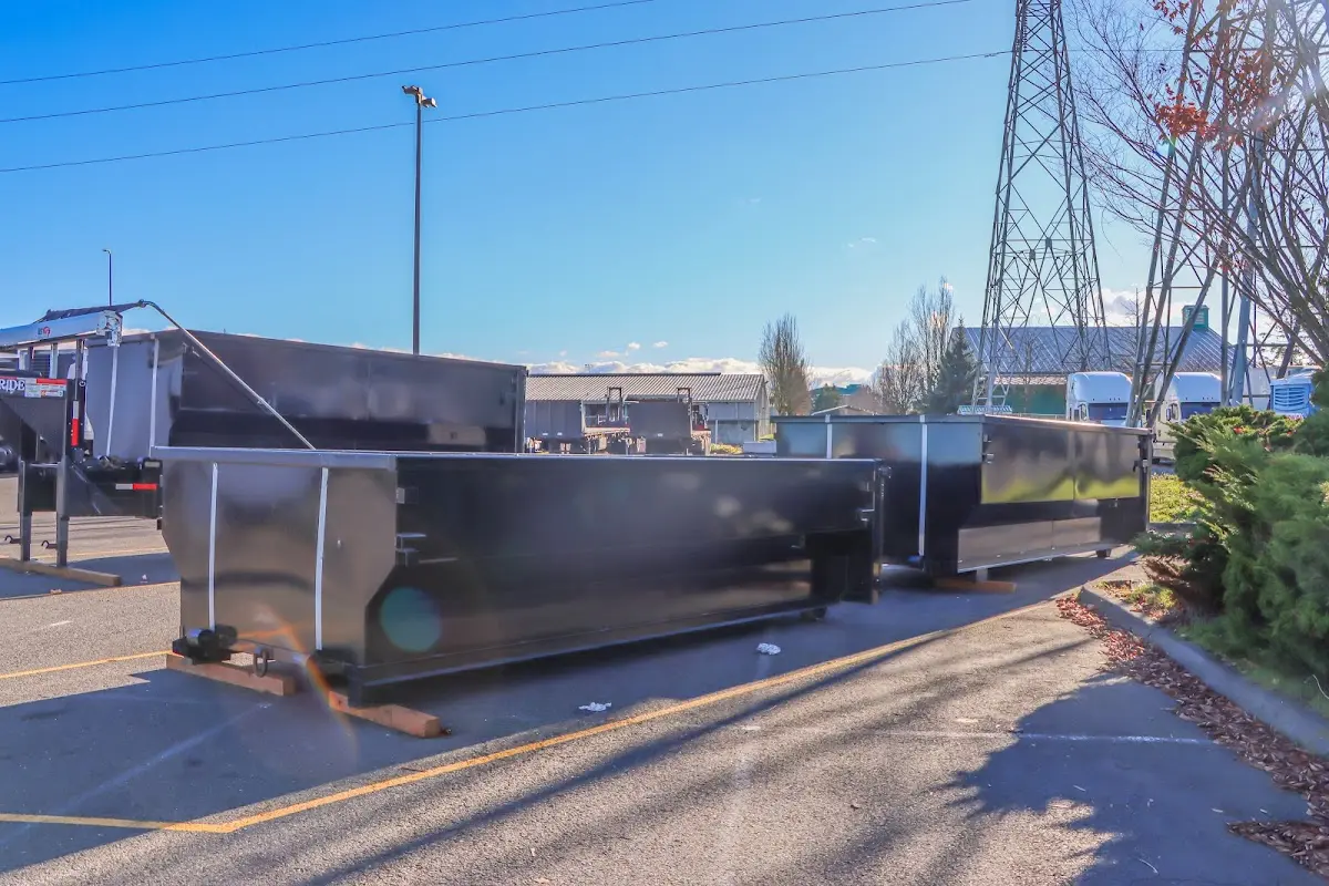 Roll-off dumpster ready for waste disposal at job site for 12 Yard Dumpster Rental in Kingston